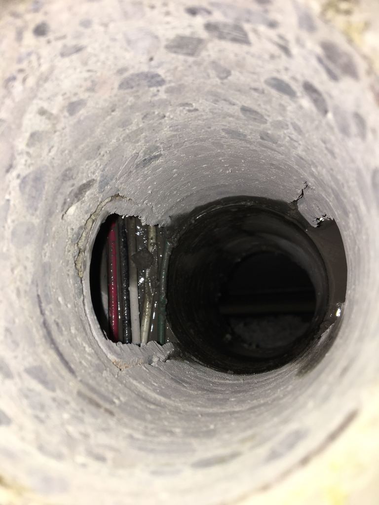 Core drilling hole showing conduit
